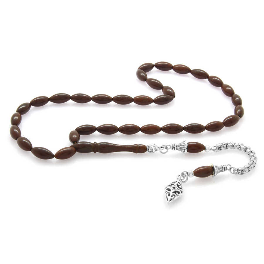 Silver-Colored Stained Metal Topped With Chopped Coca Prayer Beads